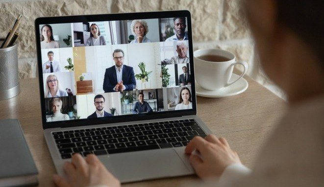 diverse-colleagues-talk-on-video-call-having-online-briefing-picture-id1221837404-1-1
