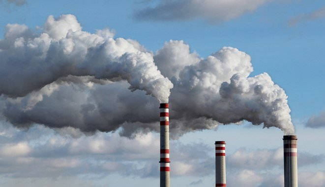 detail of white smoke polluted sky