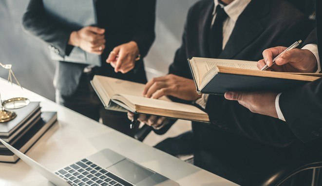 Business lawyer team. Working together of lawyer in the meeting.