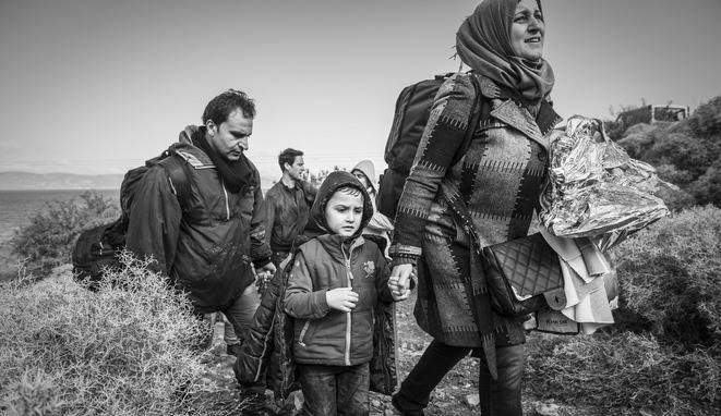 Refugee family arriving in Europe - Lesbos, Greece