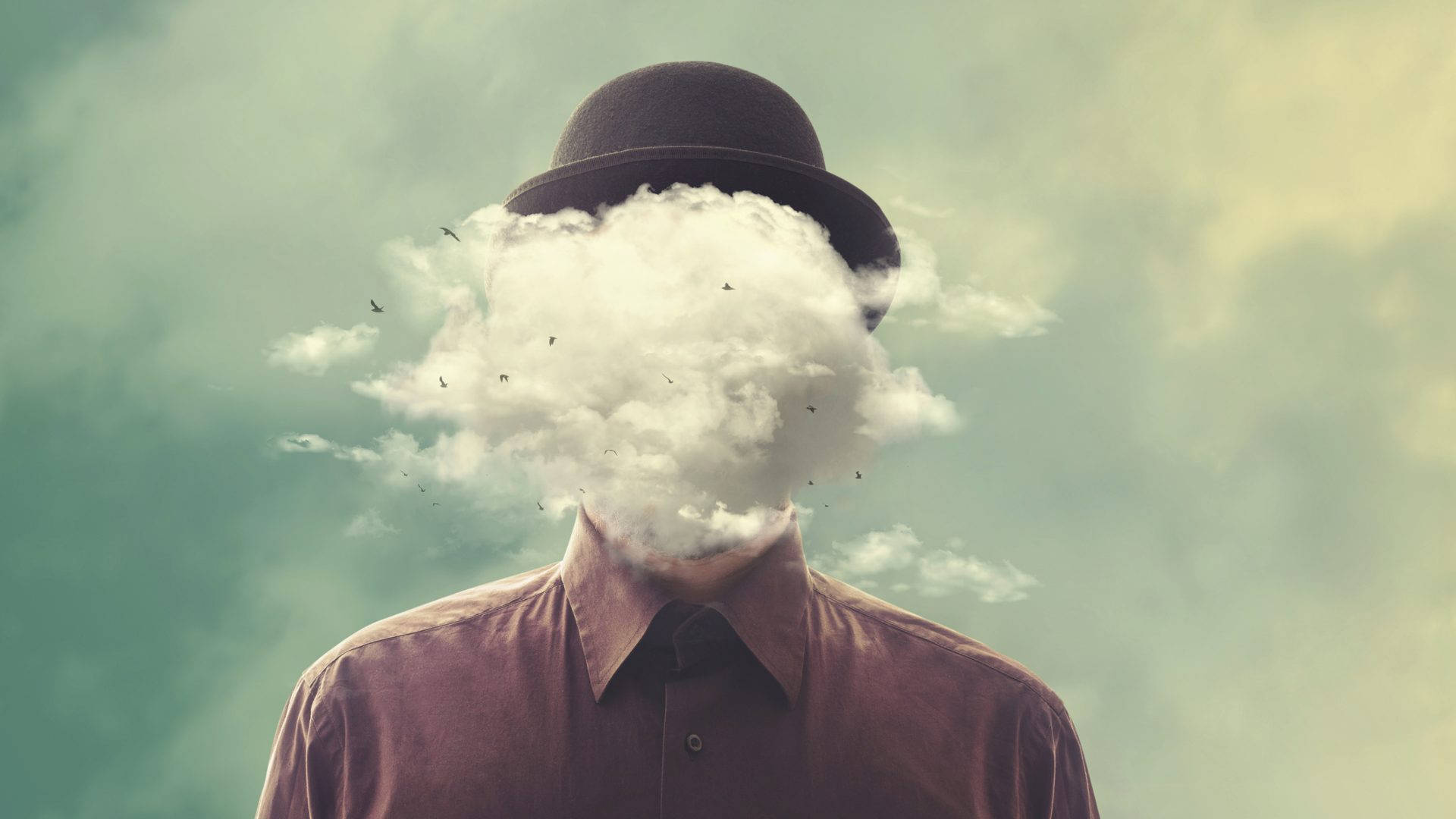 señor con la cabeza surrealista de una nube en representación de la prosopagnosia
