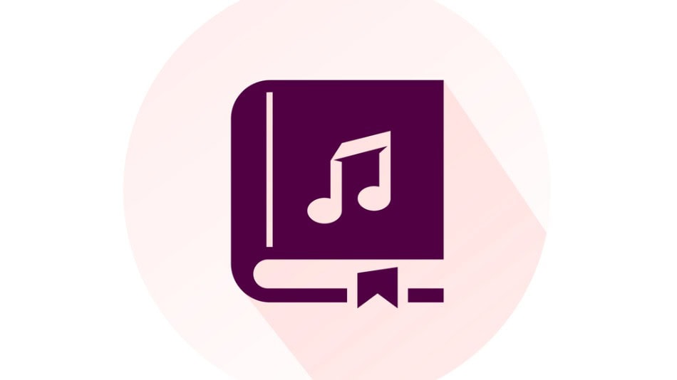Concepto de música y literatura un libro y en su cubierta una nota musical