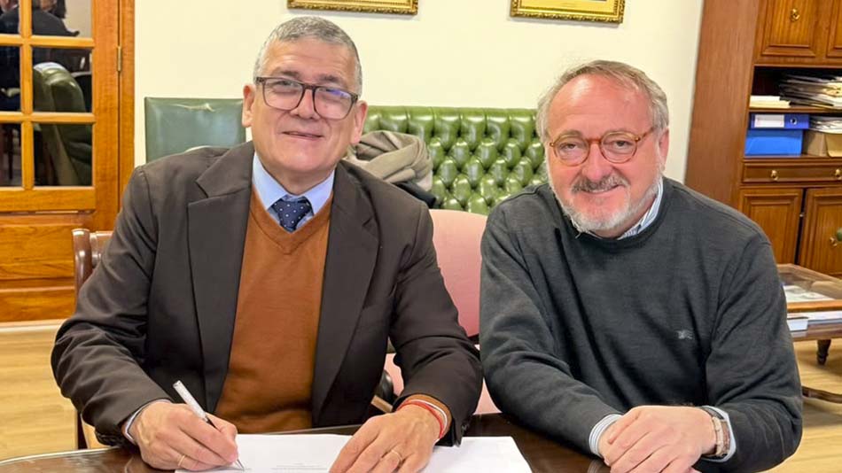 Dr. Gustavo Fleitas, rector de la Universidad y Dr. Manuel Herrera.